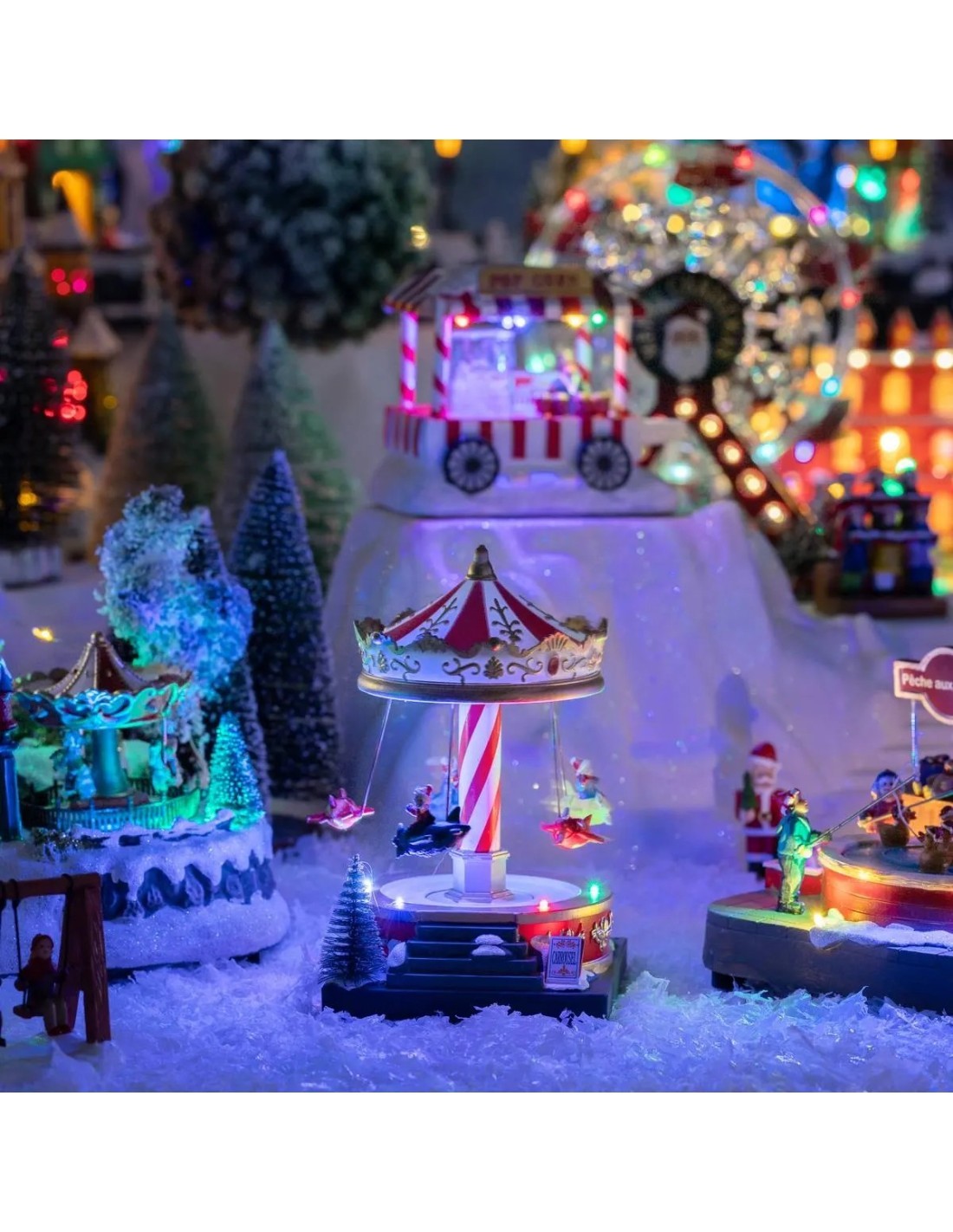 Giostrina Carosello di Natale 12x13x19 cm con Musica, Giochi di Luce e Musica Natalizia